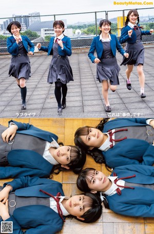 A group of young women posing for a picture together.