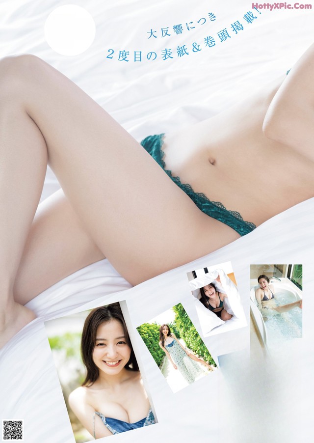 A woman laying on top of a bed in a blue lingerie.