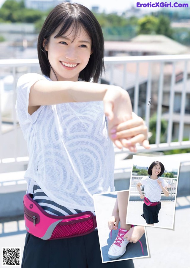 A woman in a white shirt and black skirt holding a pink fanny pack.