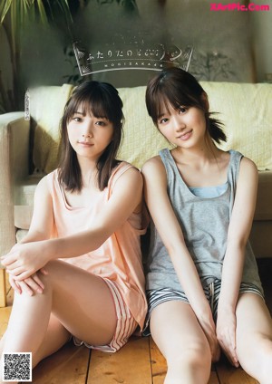 A magazine with two young women standing next to each other.