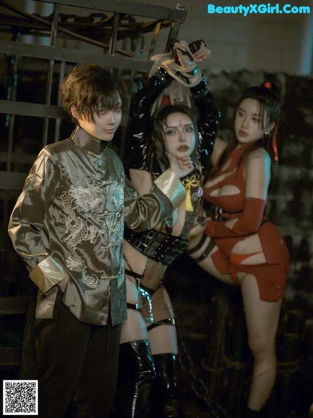 A group of young people standing next to each other.