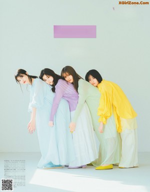 A group of young women are posing for a magazine.