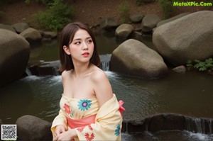 A woman in a blue dress posing for the camera.