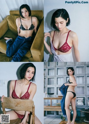A woman in a blue bra and panties standing in a room.